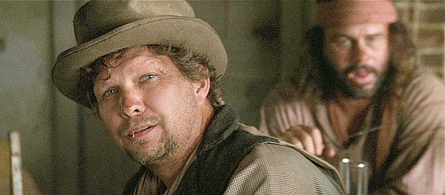 Clay Wilcox as Dick Wilber, a member of the cutthroats in Shoot First and Pray You Live (201-)