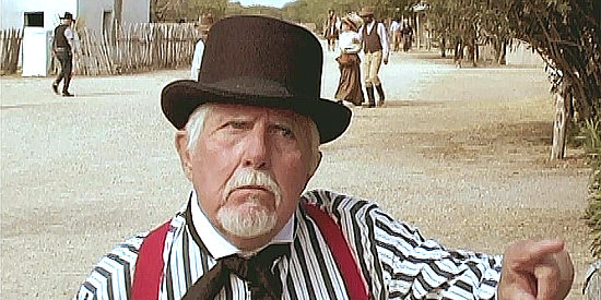 Cliff Miller as Charles Updike, the writer who's supposed to share Jack Barnett's story in Return of the Outlaws (2009)