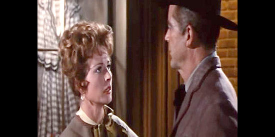 Coleen Gray as Carol Rosser, trying to convince her husband to leave a dangerous lawman's job as soon as possible in Town Tamer (1965)