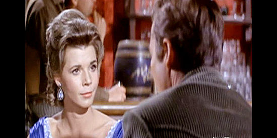 Colleen Miller as Abbie Stevens, the saloon owner who takes a liking to the man she knows as Judd Tanner in Gunfight at Comanche Creek (1964)