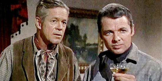 Dan Duryea as Frank Jesse and Audie Murphy as Ben Lane, intrigued by Kelly's proposition in Six Black Horses (1962)