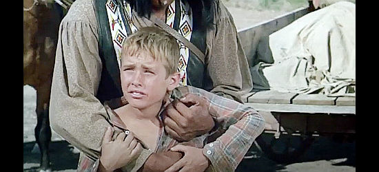 Dandy Curran as Tim Mailer, about to be kidnapped by the Apache raiders in Blood on the Arrow (1964)