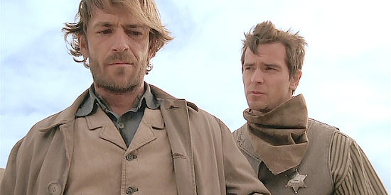 Daniel Wisner as Hank (right), a deputy warning Matt Austin about a road of revenge in The Pledge (2008)
