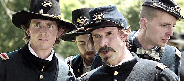 David Arquette as Capt. Henry DuPont (front right), expressing the need for reinforcements in Field of Lost Shoes (2015)