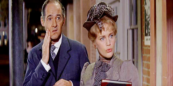 David Opatoshu as Sol Levy and Maria Schell as Sabra Cravet, reacting to Dixie's strut in Cimarron (1960)