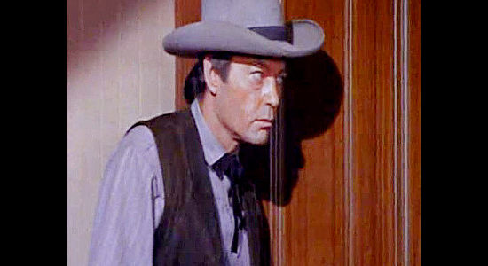 DeForest Kelley as Bill Rile, right-hand man for Joe Gore, the man who wants to rule Emporia in Waco (1966)