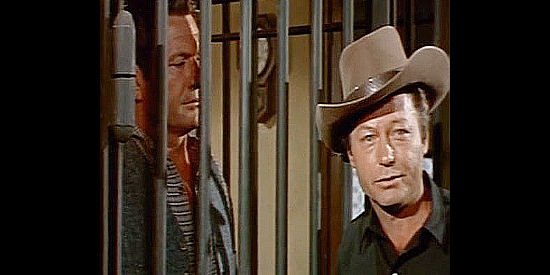 DeForest Kelly as the sheriff in Kile, intent on robbing Santee of a chance to get rich quick in Black Spurs (1965)
