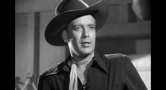 Dick Foran as Bronco Bob Mitcehll, trying to live up to a contrived reputation as a cowboy hero in Ride 'Em Cowboy (1942)