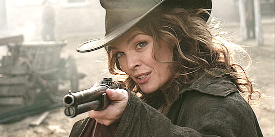 Dina Meyer as Calathea Massey, with Red Cavanaugh under her gun in Dead in Tombstone (2013)