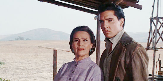 Dolores Del Rio as Neddy with Elvis Presley as Pacer, discussing a lot rider she spotted near their ranch in Flaming Star (1960)