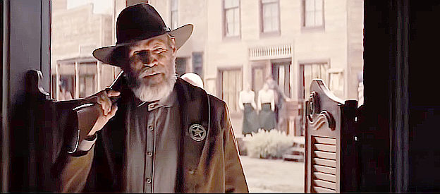 Don Stroud as Sheriff Bill Sharp, a lawman with a price on his head in Django Unchained (2012)