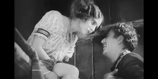 Dorothy Burgess as Tonia Maria, jealous because The Cisco Kid (Warner Baxter) smells so good after a trip to the barbershop In Old Arizona (1928)