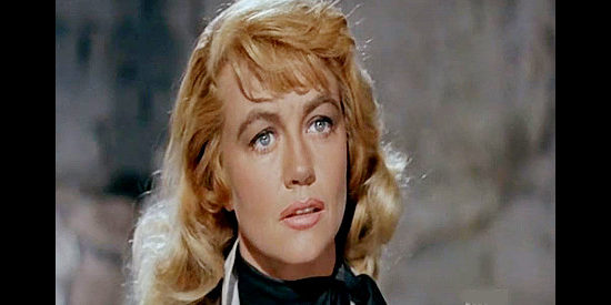 Dorothy Malone as Belle Breckenridge, a married woman whose life is thrown in turmoil when former lover Brendan O'Mally shows up in The Last Sunset (1961)