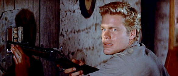 Doug McClure as Andy Zachary, following big brother Ben's orders in The Unforgiven (1960)