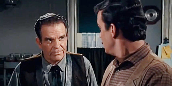 Douglas Kenney as Joe, a sheriff giving orders to his deputy in The Fastest Guitar Alive (1967)