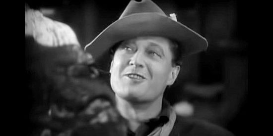 Edmund Lowe as Sgt. Mickey Dunn, meeting flirtacious Tonia Maria in In Old Arizona (1928)