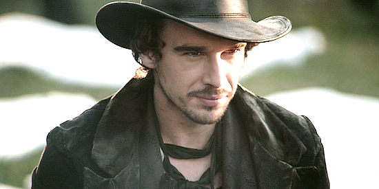 Edward Akrout as Snake, a member of the Blackwater Gang in Dead in Tombstone (2013)