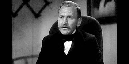 Edward Van Sloan as Judge Cody, the man who makes it more difficult for Clay Tallant to hold Mannon's men accountable in The Arizonian (1935)