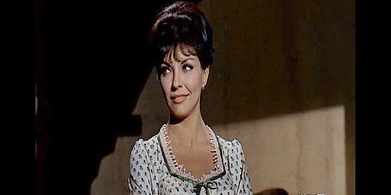 Elsa Cardenas as Consuela Stark, looking for a handsome man to rescue her from a marriage to a much older man in Taggart (1964)