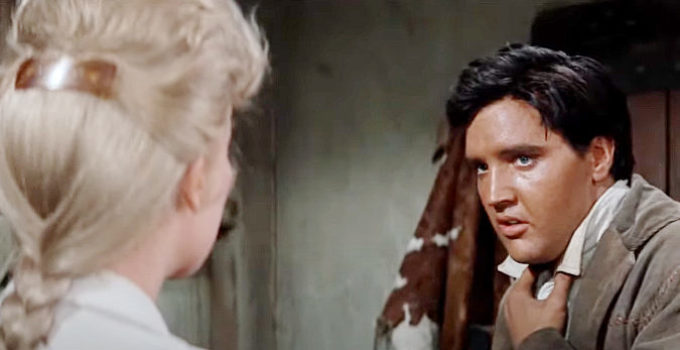 Elvis Presley as Pacer with Barbara Eden as Roslyn Pierce is Flaming Star (1960)