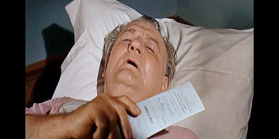 Emile Meyer as Ben Blazer, on his death bed but still mean enough to issue a murder warrant against Taggart in Taggart (1964)