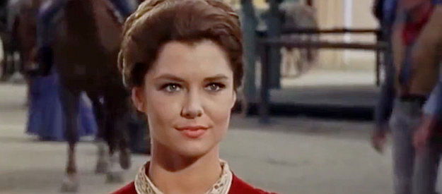 Emily Banks as Amy Martin, welcoming home the man she thought had died in the war in Gunfight in Abilene (1967)