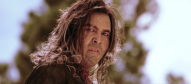 Eric Schweig as El Brujo, leaders of the band of renegades who capture white women in The Missing (2003)