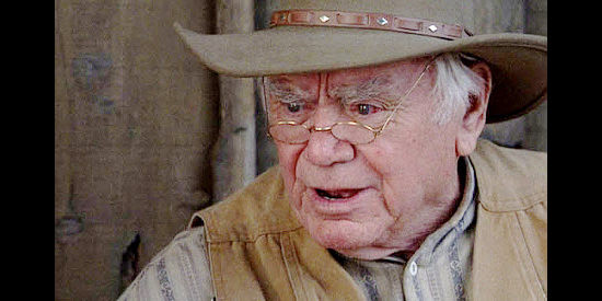 Ernest Borgnine as Eugene Lawson, the man who takes on interest in Keenan and Christine in The Trail to Hope Rose (2004)