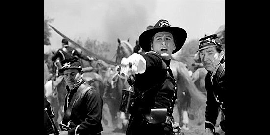 Errol Flynn as George Armonstrong Custer, leading a charge during the Civil War in They Died with Their Boots On (1941)