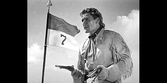 Errol Flynn as George Armstrong Custer, out of ammunition as the Sioux approach in They Died with Their Boots On (1941)