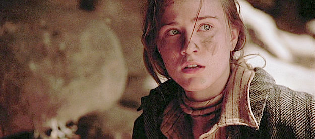 Evan Rachel Wood as Lilly Gilkeson, a kidnapped girl with escape on her mind in The Missing (2003)