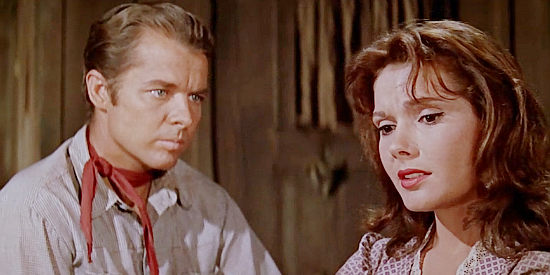 Felicia Farr as Janet, sharing the story of her background with Clay Santell (Audie Murphy) in Hell Bent for Leather (1960)