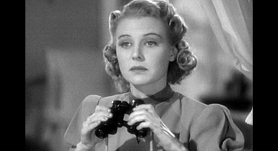 Florence Rice as Margo Thomas, becomng more interested in 'Wild Bill' Malone's antics in The Kid from Texas (1939)