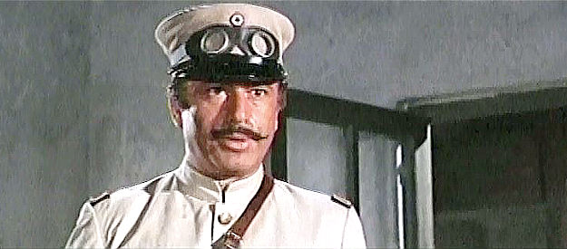 Frank Wolff as Ramirez, the officer who rapes Fina during an attack on her village in VIlla Rides (1968)
