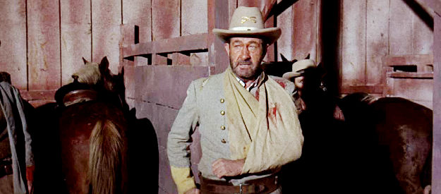 Fred Graham as William Quantrilll, cornered in a barn with the rest of his gang in Arizona Raiders (1965)