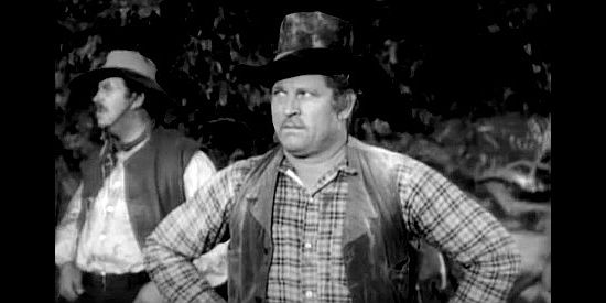 Fred Kohler as Lee Murdock, secretly plotting the demise of a wagon train in Fighting Caravans (1931)