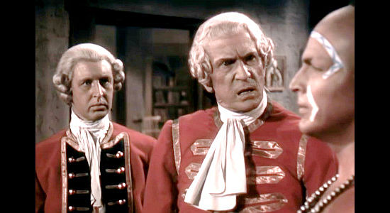 Frederick Worlock as Gen. Webb, questioning his trusted scout Magua in Last of the Redmen (1947)