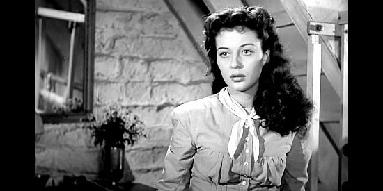 Gail Russell as Penelope Worth, wondering about the women Quirt Evans is dreaming about in Angel and the Badman (1947)