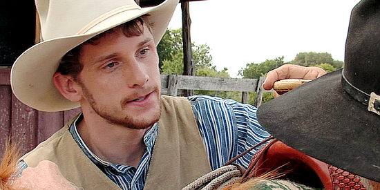 Garrett Graham as Travis, Tommy Hill's son, left behind when the elders ride off in Six Gun (2008)