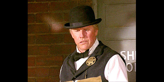 Gary Busey as the sheriff in Hooded Angels (2000)