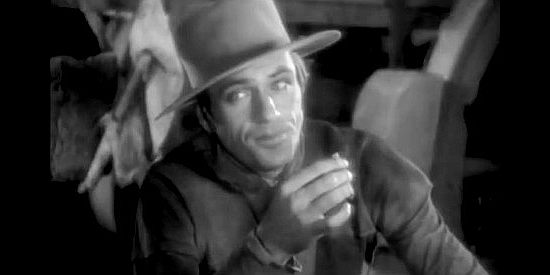 Gary Cooper as Clint Belmet, reluctant to give up any of the freedom he enjoys as a frontier scout in Fighting Caravans (1931)