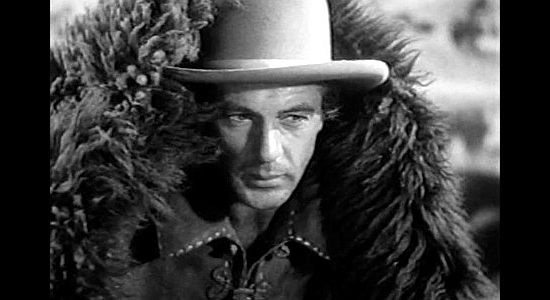 Gary Cooper as Wild Bill Hickok, doing his scouting disguised in a buffalo robe in The Plainsman (1936)