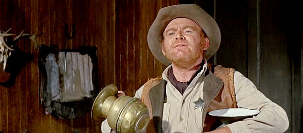 Gene Evans as Hoag, the deputy in the town Frank Pierce runs in The War Wagon (1967)