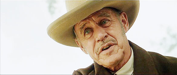 Geoffrey Lewis as Greg Sullivan, the rancher after the gold on Indian land in Renegade (2004)