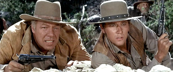 George Kennedy as Sheriff July Johnson and Andrew Prine as Deputy Roscoe Bookbinder in Bandolero! (1969)