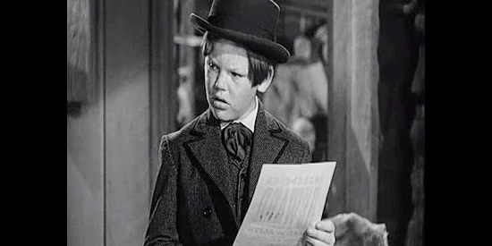 George McDonald as Junior, the troublesome youth who might be able to identify a bank robber in Four Faces West (1948)