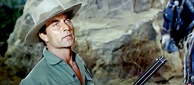 George Montgomery as Gid McCool, knowing trouble likely lurks on the trip to Huntsville in Hostile Guns (1967)