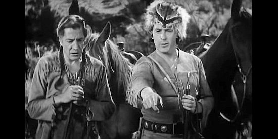 George Regas as Black Eagle and George O'Brien as Daniel Boone, scouting for Indian trouble in Daniel Boone (1936)