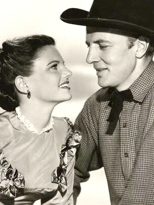 Geraldine Brooks as Mary Hathaway and Bruce Bennett as Jim Younger in "The Younger Brothers" (1949)