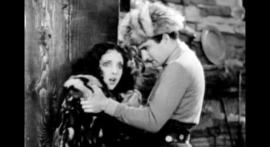Gilbert Roland as Louis La Bey, trying to find out why Woolie-Woolie (Nina Quartero) was spying on him in Men of the North (1930)